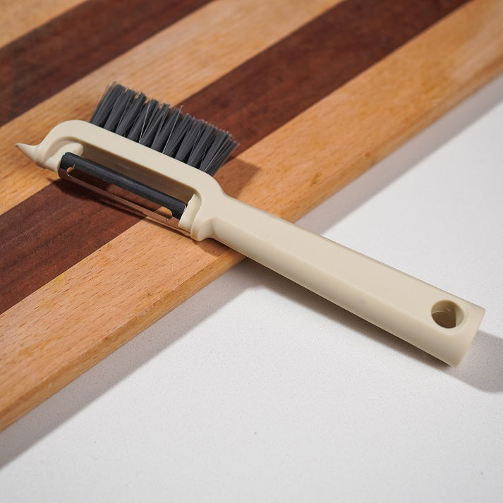 Peeler with Brush